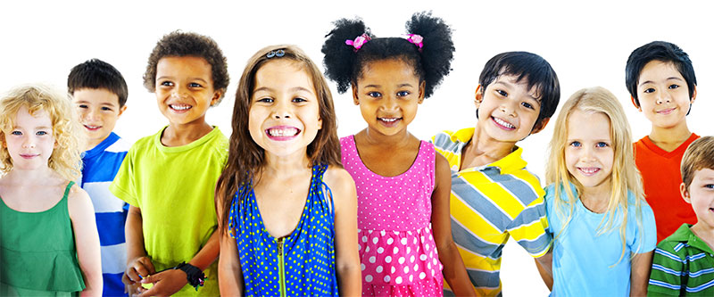 The image shows a diverse group of children posing together, with each child wearing different colored shirts and shorts.